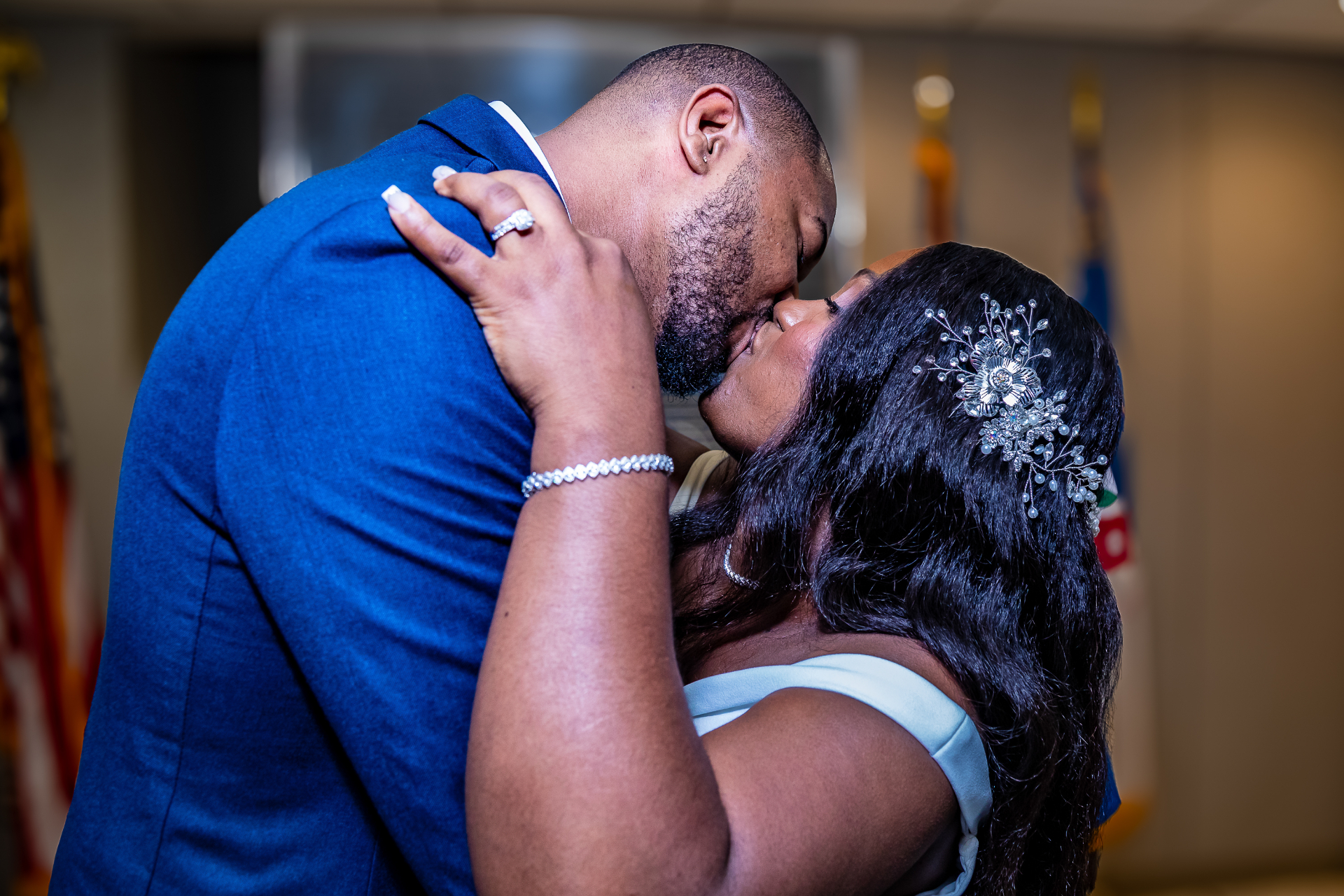 Wedding couple sharing their first kiss